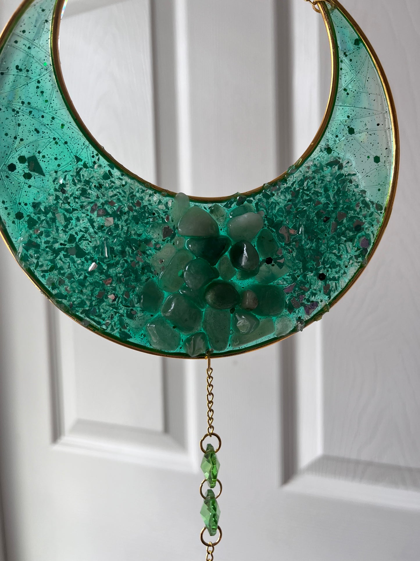Green aventurine crescent moon suncatcher with crystal accents